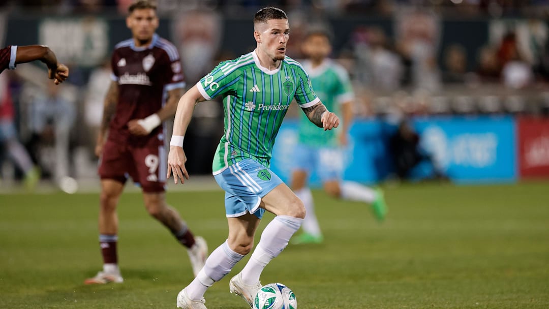 Apr 26, 2025; Commerce City, Colorado, USA; Seattle Sounders forward Ryan Kent (77) controls the ball in the second half against the Colorado Rapids at Dick's Sporting Goods Park. Mandatory Credit: Isaiah J. Downing-Imagn Images
