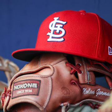 Sep 5, 2023; Atlanta, Georgia, USA; A detailed view of the hat and glove of St. Louis Cardinals second baseman Nolan Gorman (not pictured) before a game against the Atlanta Braves at Truist Park. Mandatory Credit: Brett Davis-Imagn Images