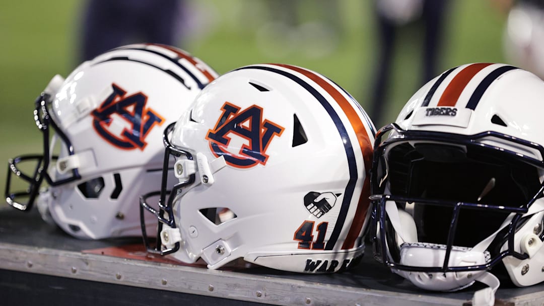 Oct 2, 2021; Baton Rouge, Louisiana, USA; Auburn Tigers helmets sits on a crate during a game against LSU Tigers at Tiger Stadium. Mandatory Credit: Stephen Lew-Imagn Images