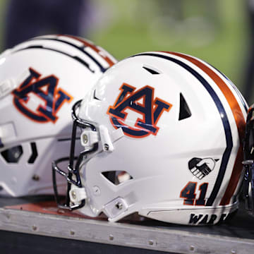 Oct 2, 2021; Baton Rouge, Louisiana, USA; Auburn Tigers helmets sits on a crate during a game against LSU Tigers at Tiger Stadium. Mandatory Credit: Stephen Lew-Imagn Images