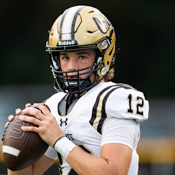 Buchholz Bobcats quarterback Trace Johnson (12) looks to throw against the Eastside Rams before the game at Citizens Field in Gainesville, FL on Friday, September 6, 2024. [Matt Pendleton/Gainesville Sun]