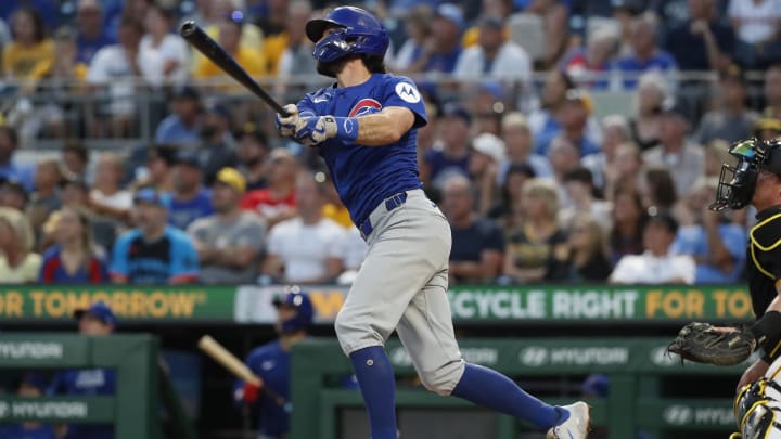 Aug 27, 2024; Pittsburgh, Pennsylvania, USA;  Chicago Cubs shortstop Dansby Swanson (7) hits a two run home run against he Pittsburgh Pirates during the fourth inning at PNC Park.