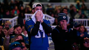 Garrett Johnson (87) and Daniel Cannady react to the sting of defeat as seconds tick off the clock during the second half Saturday, Jan 21, 2023 at TIAA Bank Field's Dream Finders Homes Flex Field at Daily's Place in Jacksonville, Fla. 