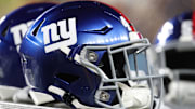 Oct 28, 2024; Pittsburgh, Pennsylvania, USA;  New York Giants helmets on the sidelines against the Pittsburgh Steelers during the third quarter at Acrisure Stadium. Mandatory Credit: Charles LeClaire-Imagn Images