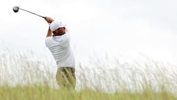 Scottie Scheffler tees off during a practice round at Oakmont Country Club ahead of the 2025 U.S. Open