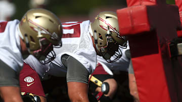 FSU's offensive line works out during their opening practice for fall camp at the Al Dunlap Training Facility Monday, Aug. 6, 2018. 

636691563153527519-B49I3032.jpg