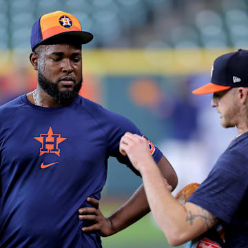 May 20, 2024; Houston, Texas, USA; Houston Astros starting pitcher Cristian Javier (53) talks with relief pitcher Josh Hader (71) prior to the game against the Los Angeles Angels at Minute Maid Park. 