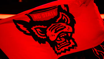 Nov 22, 2024; Raleigh, North Carolina, USA;  North Carolina State Wolfpack flag prior to the first half of the game against the William & Mary Tribe at Lenovo Center. Mandatory Credit: Jaylynn Nash-Imagn Images