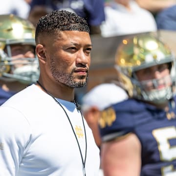Apr 12, 2025; Notre Dame, IN, USA; Notre Dame Fighting Irish head coach Marcus Freeman waits to run onto the field during the Blue-Gold game at Notre Dame Stadium. 