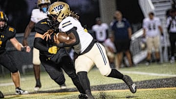 Javian Mallory, a running back for West Boca Raton runs for yards against Bishop Verot High School on Friday, Oct. 18, 2024. West Boca Raton won.