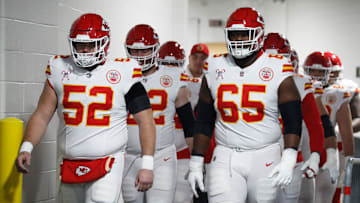 Dec 25, 2024; Pittsburgh, Pennsylvania, USA;  Kansas City Chiefs center Creed Humphrey (52) and guard Trey Smith (65) walk to the field to warm up against the Pittsburgh Steelers at Acrisure Stadium. Mandatory Credit: Charles LeClaire-Imagn Images
