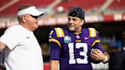 LSU Tigers head coach Brian Kelly and quarterback Garrett Nussmeier (13)