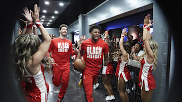 Feb 28, 2023; Houston, Texas, USA; Houston Rockets guard Jalen Green (4) and center Alperen Sengun (28) run towards the court