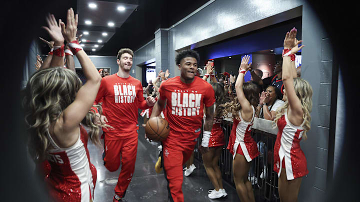 Feb 28, 2023; Houston, Texas, USA; Houston Rockets guard Jalen Green (4) and center Alperen Sengun (28) run towards the court