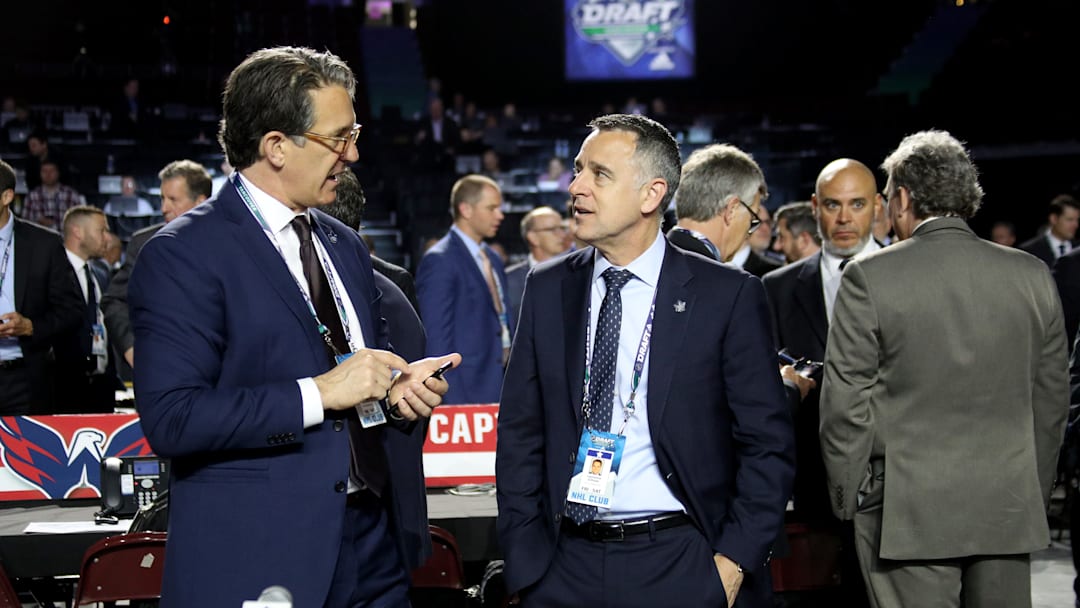 Brendan Shanahan, and Laurence Gilman in discussion at the 2019 NHL Draft
