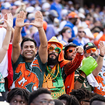 Aug 31, 2024; Gainesville, Florida, USA; Miami Hurricanes fans gesture against the Florida Gators during the first half at Ben Hill Griffin Stadium. Mandatory Credit: Matt Pendleton-Imagn Images