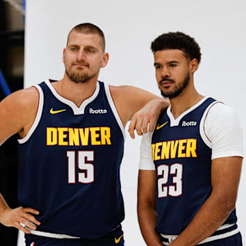 Sep 29, 2025; Denver, CO, USA; Denver Nuggets players Nikola Jokic (15) and Cam Johnson (23) pose for a picture during media day at Ball Arena. Mandatory Credit: Isaiah J. Downing-Imagn Images