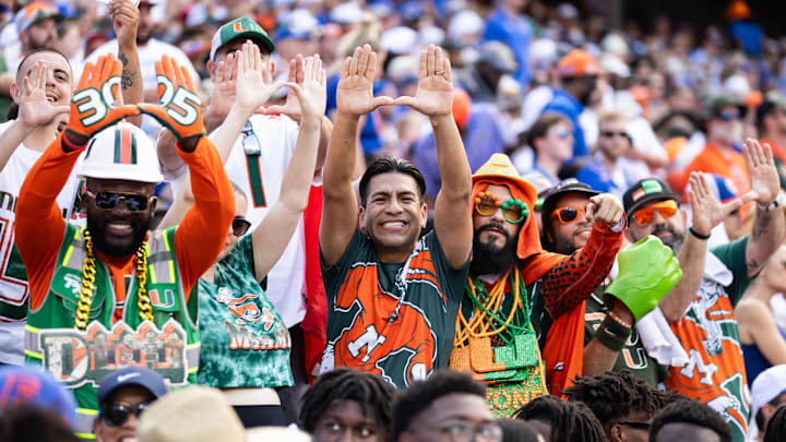 Aug 31, 2024; Gainesville, Florida, USA; Miami Hurricanes fans gesture against the Florida Gators during the first half at Ben Hill Griffin Stadium. Mandatory Credit: Matt Pendleton-Imagn Images