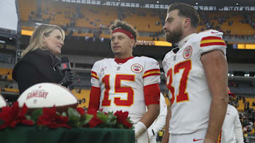 Dec 25, 2024; Pittsburgh, Pennsylvania, USA;  Netflix reporter Stacey Dales (left) interviews Kansas City Chiefs quarterback Patrick Mahomes (15) and tight end Travis Kelce (87) after the Chief defeated the Pittsburgh Steelers at Acrisure Stadium. Mandatory Credit: Charles LeClaire-Imagn Images
