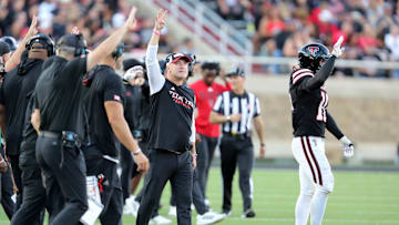 Nov 15, 2025; Lubbock, Texas, USA;  Texas Tech Red Raiders head coach Joey McGuire signals the start of the fourth quarter against the Central Florida Knights at Jones AT&T Stadium. Mandatory Credit: Michael C. Johnson-Imagn Images