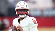 Sep 25, 2025; Glendale, Arizona, USA; Arizona Cardinals quarterback Kyler Murray (1) warms up before the game against the Seattle Seahawks at State Farm Stadium. Mandatory Credit: Mark J. Rebilas-Imagn Images