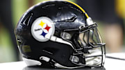 Aug 9, 2024; Pittsburgh, Pennsylvania, USA;  A Pittsburgh Steelers helmet sits on an equipment trunk during the game against the Houston Texans during the fourth quarter at Acrisure Stadium. Mandatory Credit: Charles LeClaire-Imagn Images