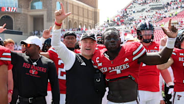 Sep 14, 2024; Lubbock, Texas, USA;  Texas Tech Red Raiders head coach Joey McGuire and defensive back Bryce Ramirez (3) react after a game against the North Texas Mean Green at Jones AT&T Stadium and Cody Campbell Field. Mandatory Credit: Michael C. Johnson-Imagn Images