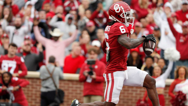 Oklahoma's Deion Burks leaps to the end zone after a reception during a University of Oklahoma (OU) Sooners spring football game at Gaylord Family-Oklahoma Memorial Stadium in Norman, Okla., Saturday, April 20, 2024.