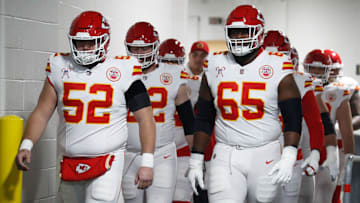 Dec 25, 2024; Pittsburgh, Pennsylvania, USA;  Kansas City Chiefs center Creed Humphrey (52) and guard Trey Smith (65) walk to the field to warm up against the Pittsburgh Steelers at Acrisure Stadium. Mandatory Credit: Charles LeClaire-Imagn Images