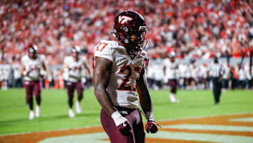Sep 27, 2025; Raleigh, N.C.; Virginia Tech running back Marcellous Hawkins (27) makes a touchdown and celebrates during the first half.