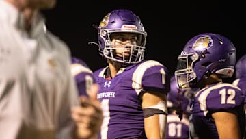 Bulldogs quarterback Tait Reynolds (1) at Queen Creek High School football field on Oct. 26, 2023.