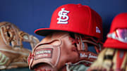Sep 5, 2023; Atlanta, Georgia, USA; A detailed view of the hat and glove of St. Louis Cardinals second baseman Nolan Gorman (not pictured) before a game against the Atlanta Braves at Truist Park. Mandatory Credit: Brett Davis-Imagn Images