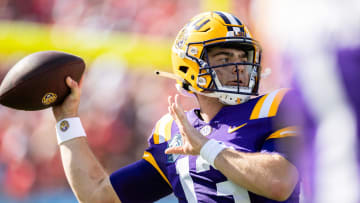 Jan 1, 2024; Tampa, FL, USA; LSU Tigers quarterback Garrett Nussmeier (13) looks to throw during the first half against the Wisconsin Badgers at Raymond James Stadium. Mandatory Credit: Matt Pendleton-USA TODAY Sports