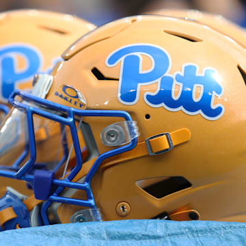 Sep 27, 2025; Pittsburgh, Pennsylvania, USA;  Pittsburgh Panthers helmets on the sidelines against the Louisville Cardinals during the second quarter at Acrisure Stadium. Mandatory Credit: Charles LeClaire-Imagn Images