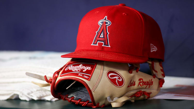 A detailed view of a Los Angeles Angels hat and glove