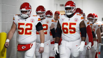 Dec 25, 2024; Pittsburgh, Pennsylvania, USA;  Kansas City Chiefs center Creed Humphrey (52) and guard Trey Smith (65) walk to the field to warm up against the Pittsburgh Steelers at Acrisure Stadium. Mandatory Credit: Charles LeClaire-Imagn Images