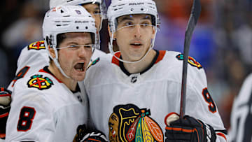 Oct 28, 2024; Denver, Colorado, USA; Chicago Blackhawks center Ryan Donato (8) celebrates his goal with right wing Ilya Mikheyev (95) in the third period against the Colorado Avalanche at Ball Arena. Mandatory Credit: Isaiah J. Downing-Imagn Images