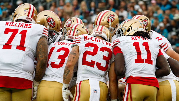 Nov 12, 2023; Jacksonville, Florida, USA; San Francisco 49ers offense huddles around quarterback Brock Purdy (13) against Jacksonville Jaguars during the second quarter at EverBank Stadium. Mandatory Credit: Morgan Tencza-Imagn Images