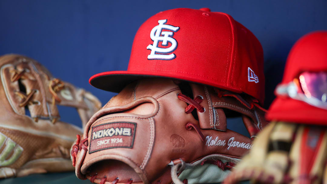 Sep 5, 2023; Atlanta, Georgia, USA; A detailed view of the hat and glove of St. Louis Cardinals second baseman Nolan Gorman (not pictured) before a game against the Atlanta Braves at Truist Park. Mandatory Credit: Brett Davis-Imagn Images