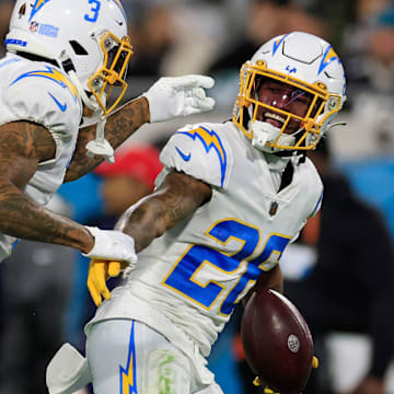 Los Angeles Chargers cornerback Asante Samuel Jr. (26) tallies an interception as he celebrates with safety Derwin James Jr. (3) on a pass intended for Jacksonville Jaguars tight end Evan Engram (17), not shown, during the second quarter of an NFL first round playoff football matchup Saturday, Jan. 14, 2023 at TIAA Bank Field in Jacksonville, Fla. The Jacksonville Jaguars edged the Los Angeles Chargers on a field goal 31-30. [Corey Perrine/Florida Times-Union]

Jki 011423 Chargers Jags Cp 110