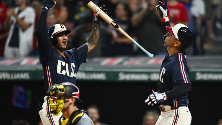 Aug 30, 2024; Cleveland, Ohio, USA; Cleveland Guardians second baseman Andres Gimenez, right, and shortstop Brayan Rocchio celebrate after Gimenez hit a home run during the fifth inning against the Pittsburgh Pirates at Progressive Field. Mandatory Credit: Ken Blaze-USA TODAY Sports