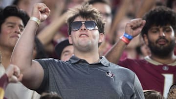 Florida State Seminole fans cheer on the football team as they play the Miami Hurricanes on Saturday, Oct. 4, 2025.