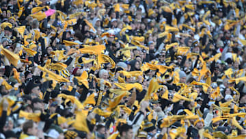 Dec 8, 2024; Pittsburgh, Pennsylvania, USA;  Pittsburgh Steelers fans wave Terrible Towels against the Cleveland Browns during the fourth quarter at Acrisure Stadium. Mandatory Credit: Charles LeClaire-Imagn Images