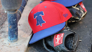 Mar 13, 2019; Tampa, FL, USA; A general view of Philadelphia Phillies hats laying in the dugout at George M. Steinbrenner Field.