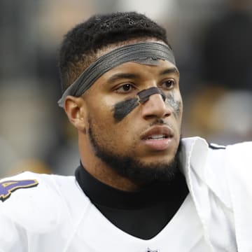 Dec 11, 2022; Pittsburgh, Pennsylvania, USA;  Baltimore Ravens cornerback Marlon Humphrey (44) looks on from the sidelines against the Pittsburgh Steelers during the fourth quarter at Acrisure Stadium. Baltimore won 16-14. Mandatory Credit: Charles LeClaire-Imagn Images