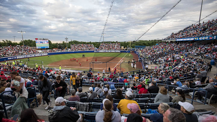 May 29, 2025; Oklahoma City, OK, USA;  Fans enjoy the game between the Ole Miss Rebels and the Texas Tech Red Raiders during the NCAA Softball Women's College World Series at Devon Park. Mandatory Credit: Brett Rojo-Imagn Images