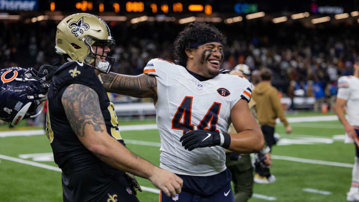 Nov 5, 2023; New Orleans, Louisiana, USA;  New Orleans Saints defensive tackle Bryan Bresee (90) hugs Chicago Bears linebacker Noah Sewell (44) after the game at the Caesars Superdome.