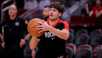 Oct 15, 2024; Houston, Texas, USA; Houston Rockets guard Reed Sheppard (15) warms up prior to the game against the New Orleans Pelicans at Toyota Center. Mandatory Credit: Erik Williams-Imagn Images