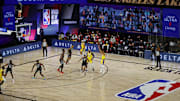 Aug 13, 2020; Lake Buena Vista, Florida, USA;  Quinn Cook #28 of the Los Angeles Lakers shoots a three point basket against the Sacramento Kings during the first quarter at The Field House at ESPN Wide World Of Sports Complex on August 13, 2020 in Lake Buena Vista, Florida. Mandatory Credit: Kevin C. Cox/Pool Photo-Imagn Images
