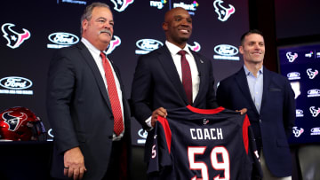 Feb 2, 2023; Houston, TX, USA; Houston Texans head coach Demeco Ryans (center) holds a jersey while